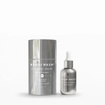 Bondi Wash Courtesy Drops skincare set featuring a tall silver cylindrical container and a smaller silver dropper bottle with a white pipette, shown on a clean white background.