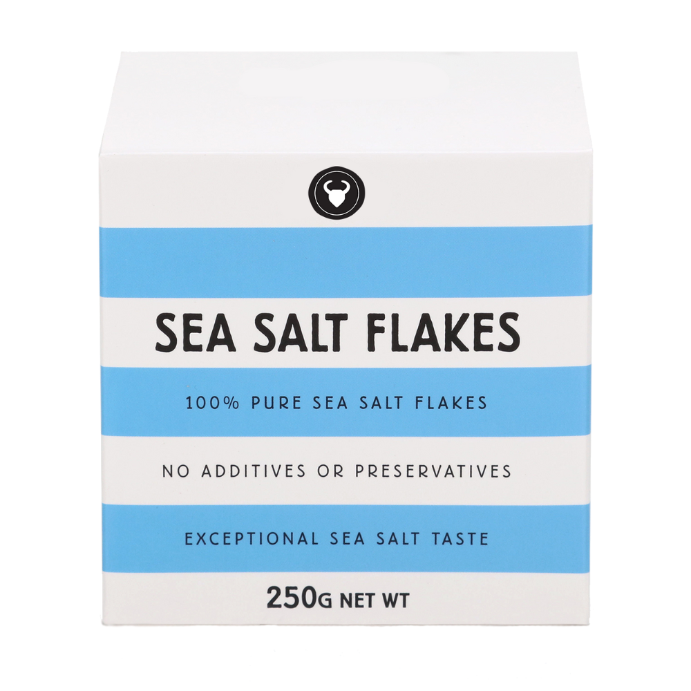 A white box of Sea Salt Flakes with light blue horizontal stripes and black text, shown on a plain white background.