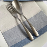 Stoff Blue linen look napkin in a table setting